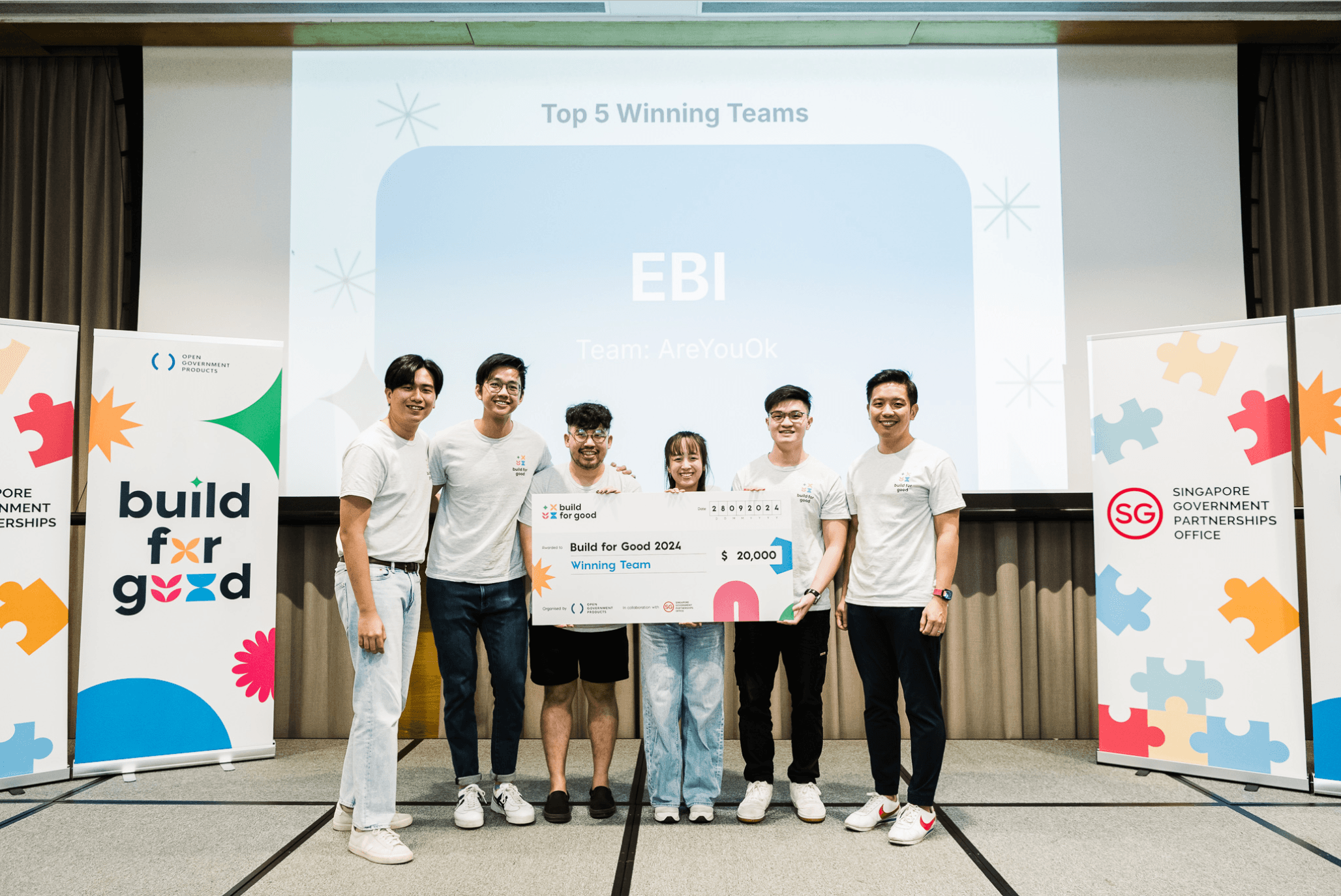 The EBI team presenting its early prototype at a hackathon
